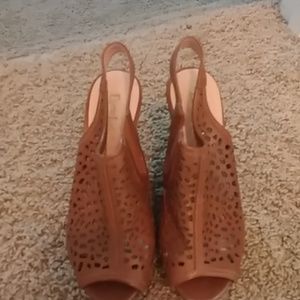 Tan wedges with the toes out